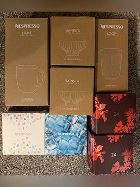 Lot of 8 boxes of Nespresso Accessories